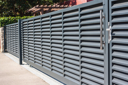 Modern fence with aluminum or metal shutter
