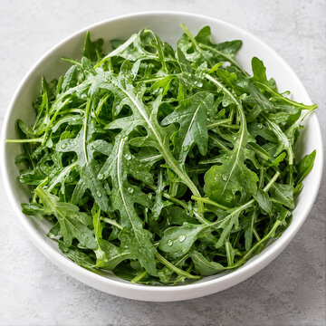 Fresh vibrant arugula leaves artistically arranged in white bowl, individual leaf texture detail, premium culinary aesthetic