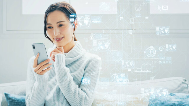 スマホをつかう女性とデジタルテクノロジー