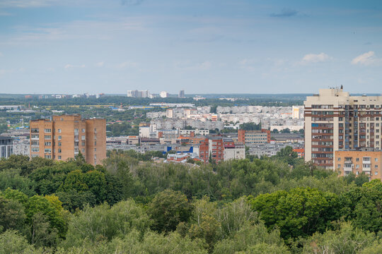 Beautiful skyline view of Tula city showcasing modern buildings and lush greenery under a bright sky