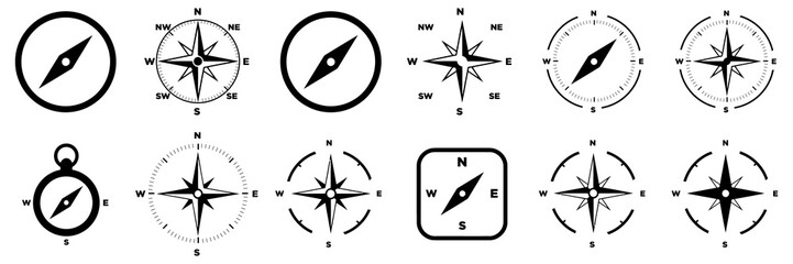 Collection of black and white compass and wind rose symbols for navigation and direction © MOHAMMADTORIQUL