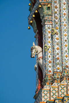 White horse statue in niche of Wat Arun prang Bangkok