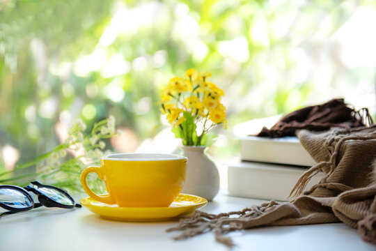 Dream plan notebook workspace inspiring personal growth and life goals with yellow cup coffee in warm sunshine.  Goal Life Wellness Concept.