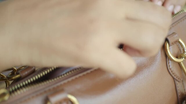Organizing a handbag by placing lip products inside it