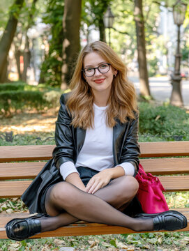 Stylish Young Woman Relaxing on Park Bench &ndash; AI Generative &ndash; No Real Persons
