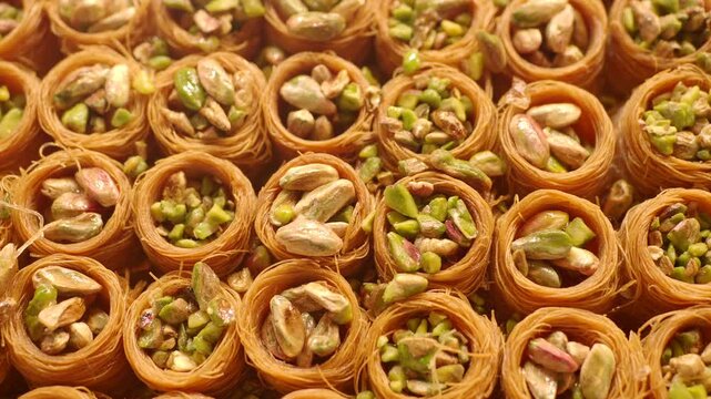Baklava with pistachio bird nest pastry video clip showing traditional middle eastern sweets