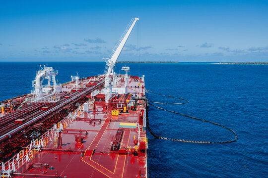 Oil Tanker Conducting Cargo Hose Transfer Operations at Offshore Single Point Mooring Terminal