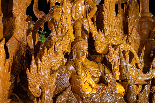 Buddhist Lent tradition, a beautiful display of wisdom, beeswax candles create art as a Buddhist offering.Background with Thai pattern carved on the surface of Lent candle.Ubon Ratchathani.Festival