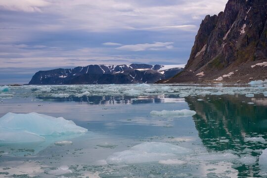 Raudfjorden mountainous landscape with drift ice, Spitsbergen, Svalbard archipelago, Norway