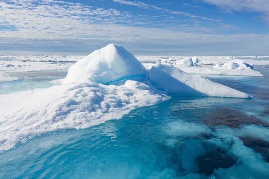Pack ice and Icebergs in the retreating Arctic Ocean at the latitude of 81&deg;3 N, Svalbard archipelago, Norway