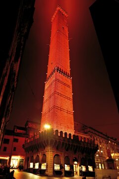 Asinelli Tower, illuminated at dusk, Bologna, Emilia-Romagna, Italy