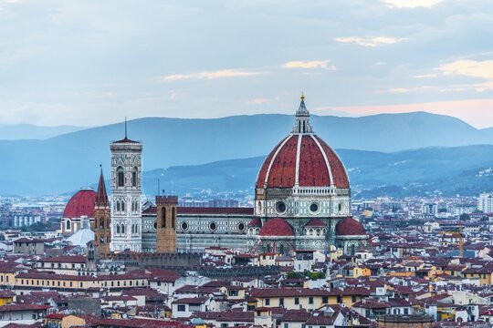 Panoramic view of the city with Florence Cathedral, Duomo Santa Maria del Fiore with the dome by Brunelleschi, UNESCO World Heritage Site, dusk, Florence, Tuscany, Italy