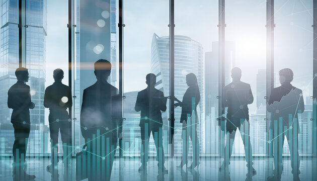 Silhouette of business people work together in office. Concept of teamwork and partnership. double exposure with light effects