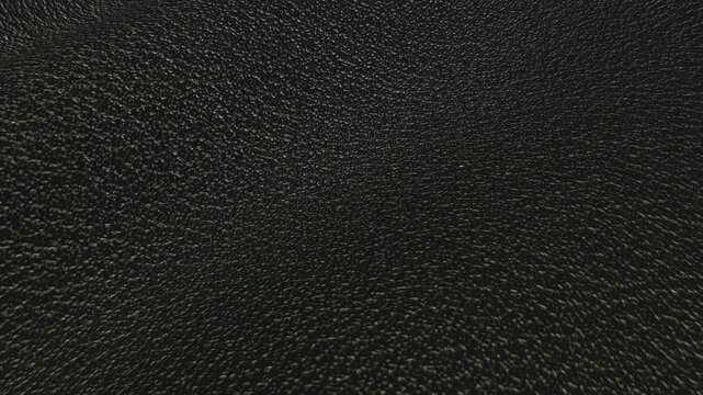 Black Smooth Leather Waves Moving in a Seamless Looped Pattern with Refined Texture and Sophisticated Premium Material Appearance for Elegant Background Design