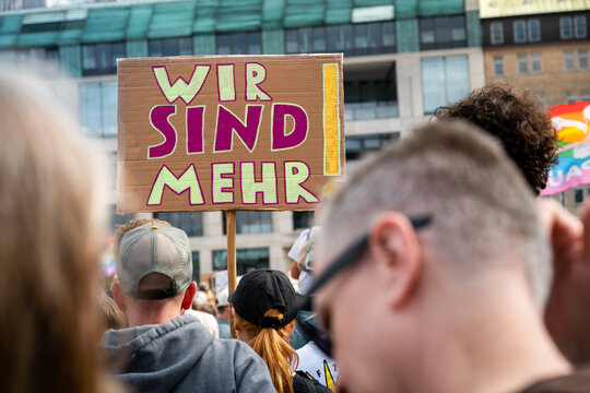 Hamburg, Germany - 12 September 2026: View of a demonstration against right-wing politics in Hamburg with people holding a sign that reads Wir sind mehr.
