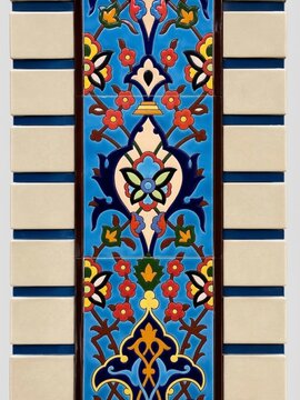 Traditional Ceramic Tile Border Design with Floral Motifs and Arabic Arabesque Patterns