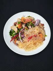 Authentic Spicy Glass Noodle Salad Yum Woon Sen With Pork Sausage And Shrimps In White Bowl © wilasinee