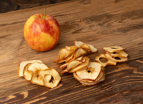 Dry apple slices pile. Dried apple chips