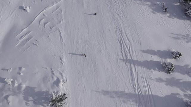 Aerial view of skier on snowy slope in Uludag, Turkey.