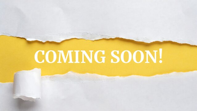 Exciting announcement imminent vibrant yellow background revealed through torn paper with 'coming soon ' text