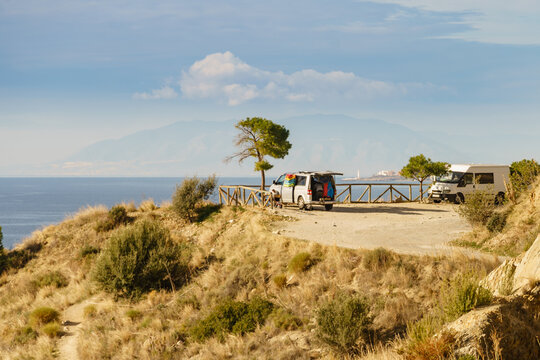 Caravans on seaside cliff of Maro Cerro Gordo. Costa del Sol, Andalusia Spain.