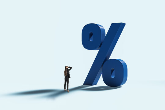 Businesswoman Thinking Beside a Large Percent Symbol Representing Mortgage Loan Credit Interest Rates and Financial Decisions on Light Background.