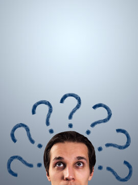Curious businessman portrait with question marks surrounding his head, seeking answers and solutions on a clean light background for business design.