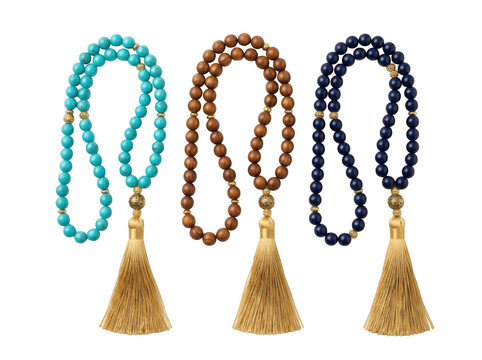 Three decorative beaded necklaces with tassels in turquoise, wood, and navy blue isolated on transparent background