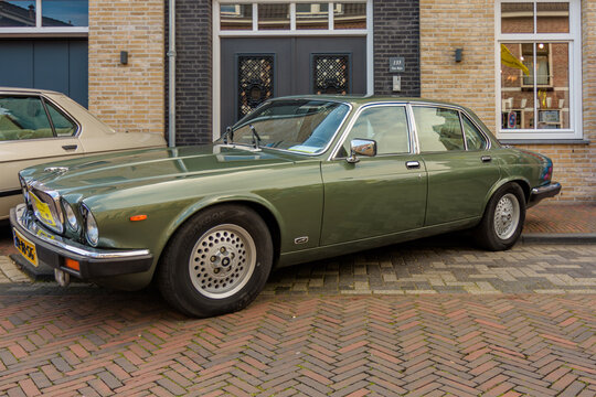 A restored Jaguar Sovereign at The Oldtimer Day in Alphen aan den Rijn, Netherlands - September 12, 2026