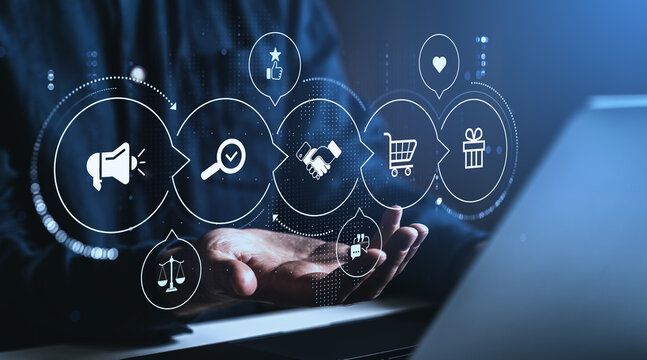 Business process and journey icons floating above hand, featuring marketing, review, partnership, shopping and loyalty sketch concepts in blue light.