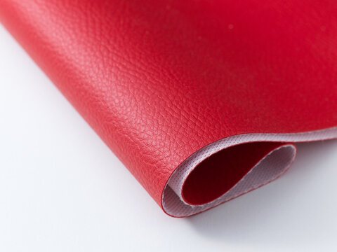 Folded Red Synthetic Leather Sheet with Fabric Backing Close Up
