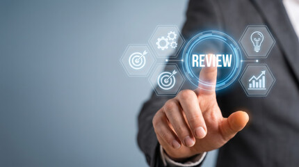 Obraz premium Businessperson pressing review interface for new year goal achievement and resolution. Future vision strategy planning. target progress success, beginning challenge, motivation inspiration