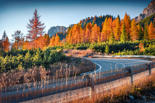 Adorable evening view of  Tre Croci Cortina Pass. Majestic autumn landscape of Dolomite Alps. Sunny outdoor scene of Italy, Europe. Traveling concept background.