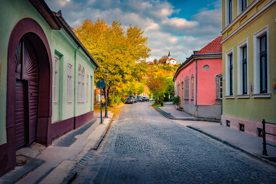 Impressive morning view of old building and empty road. Spectacular autumn cityscape of Esztergom town, Komarom-Esztergom County, Hungary, Europe. Traveling concept background.