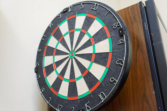 Dartboard Mounted on Wood Cabinet for Indoor Target Games and Play