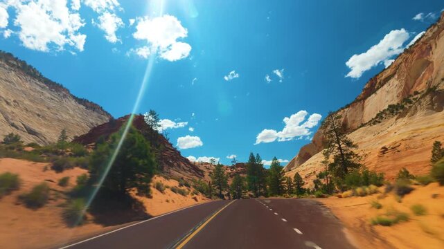 Zion National Park POV Drive Between Red Sandstone Cliffs Utah