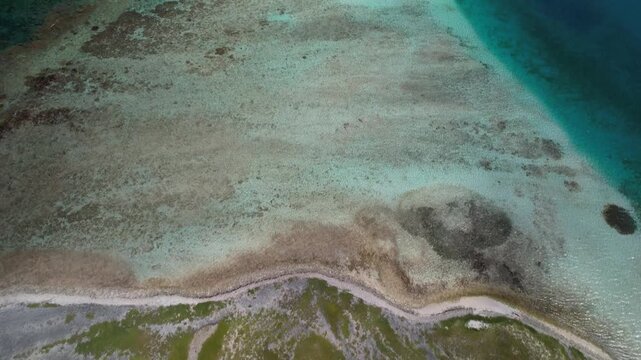 Aerial view of Los Roques archipelago with kitesurfing kites, Venezuela.