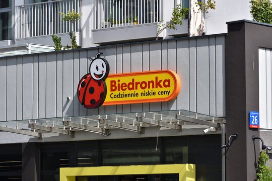 Biedronka supermarket facade with signage, emblem, logo on the facade. WARSAW, POLAND - AUGUST 8, 2026