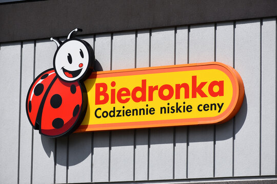 Biedronka supermarket facade with signage, emblem, logo on the facade. WARSAW, POLAND - AUGUST 8, 2026