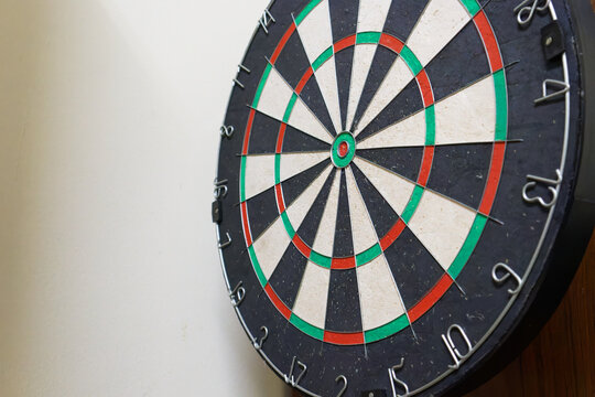 Dartboard Mounted on a Wall for Recreational Target Games and Sports