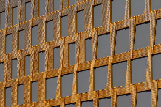 Modern building facade creating abstract geometric pattern