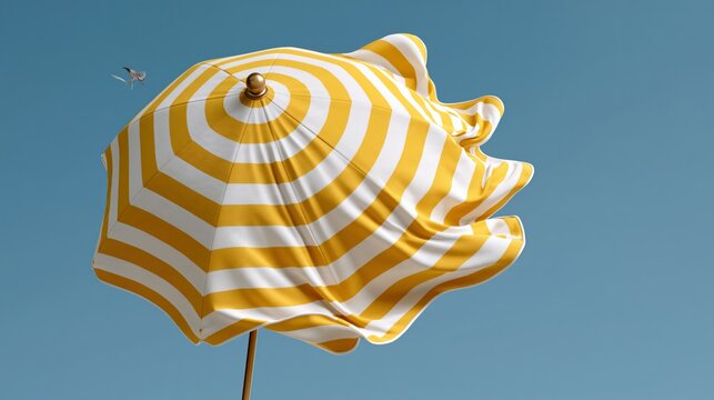 Beach umbrella trying to stay upright in the wind, looking determined, soft pastel blue sky, copy space