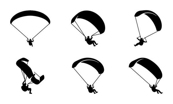 Black paraglider silhouettes on white background, extreme sport action