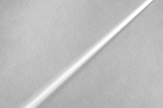 Real thin diagonal abstract shadow cut out on a transparent png background with soft diffused edges. Pairs with a minimal tech overlay, a precision and tech aesthetic as a transparent png layer.