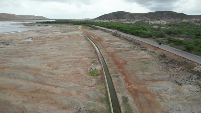 Aerial view of Araya salt flats and canal in Venezuela.