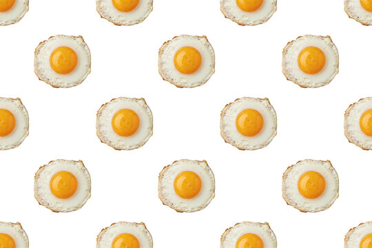 Seamless pattern of multiple fried eggs with bright yellow yolks and white egg whites arranged in rows isolated on a transparent background