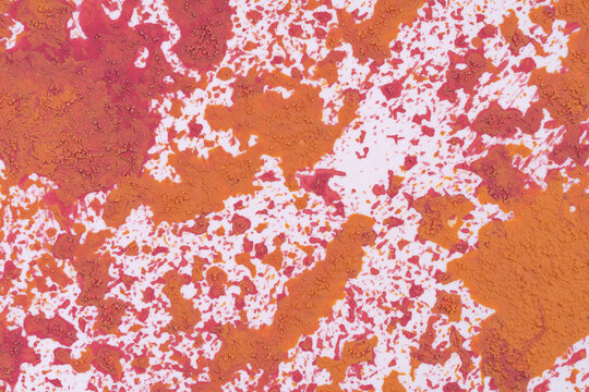 Coral and orange paint texture backdrop for energetic design.j
