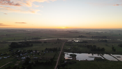 Obraz premium Sunrise over the rural outskirts of San Miguel del Monte, Buenos Aires province, Argentina.