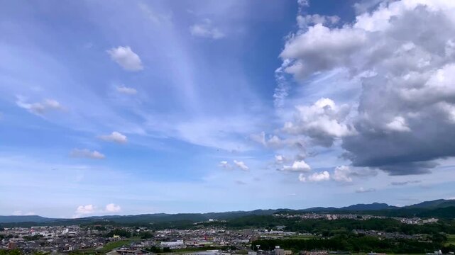 Reverse Cloud Flow Time‑Lapse Over Nabari City-seen1
