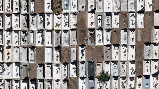 Aerial view of cemetery with rows of graves in Evora, Portugal.